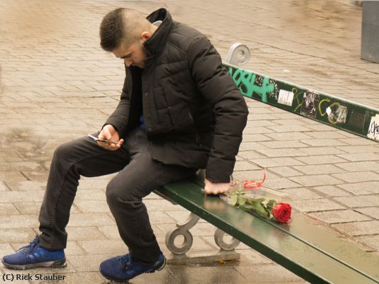 Missing Image: i_0024.jpg - Man With a Rose Texting